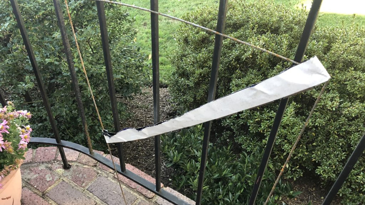 Arlington Police Warn About Razor Blades on Bottom of Political Sign