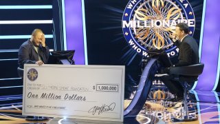 David Chang receiving the million-dollar check