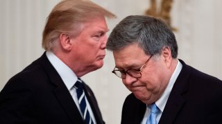 In this May 22, 2019, file photo, President Donald Trump (L) shakes hands with US Attorney General William Barr (R) during the Public Safety Officer Medal of Valor presentation ceremony at the White House in Washington, D.C.