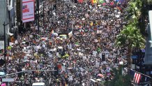 Protesters crowd Hollywood Boulevard during the All Black Lives Matter solidarity march as unrest continues in the wake of the death of George Floyd, on June 14, 2020 in Los Angeles, California.