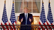 President Donald Trump gives a thumbs up upon returning to the White House from Walter Reed National Military Medical Center on Oct. 5, 2020, in Washington, D.C.