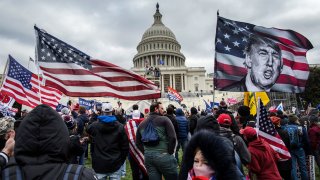 In this Jan. 6, 2021, file photo, former President Donald Trump's supporters gather outside the Capitol building.