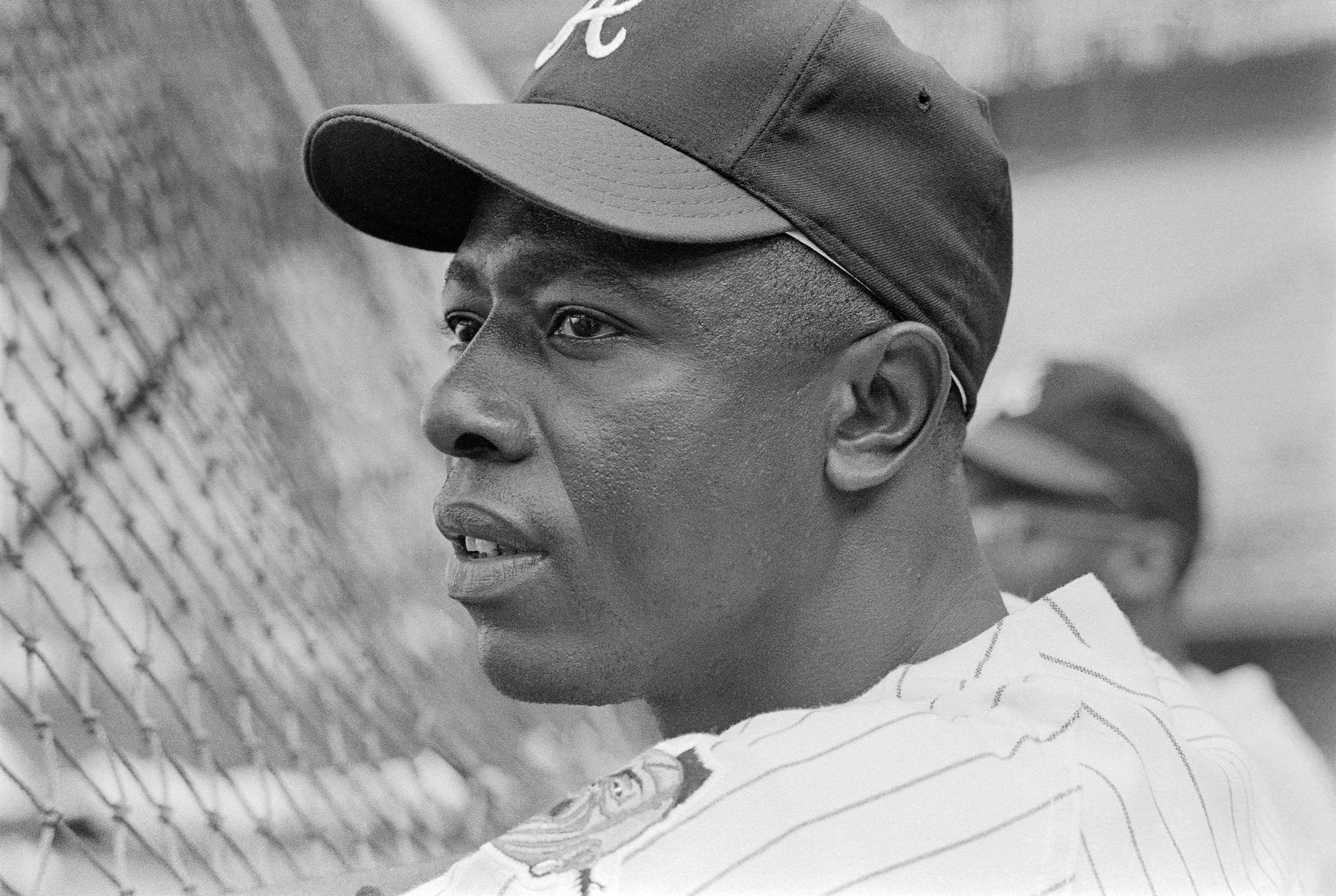 Outfielder Hank Aaron of the Milwaukee Braves looks on during batting  News Photo - Getty Images