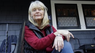 Susan Crowley, a 75-year-old retired attorney, sits outside her home in Hood River, Ore., on Jan. 23, 2021.