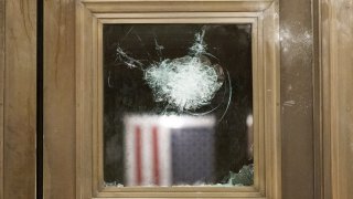 A damaged door inside the U.S. Capital