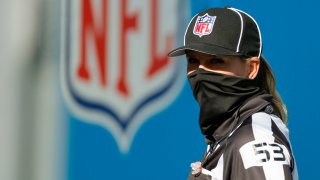 Line judge Sarah Thomas #53 looks on during warmups prior to the game between the Carolina Panthers and the Denver Broncos at Bank of America Stadium on December 13, 2020 in Charlotte, North Carolina.