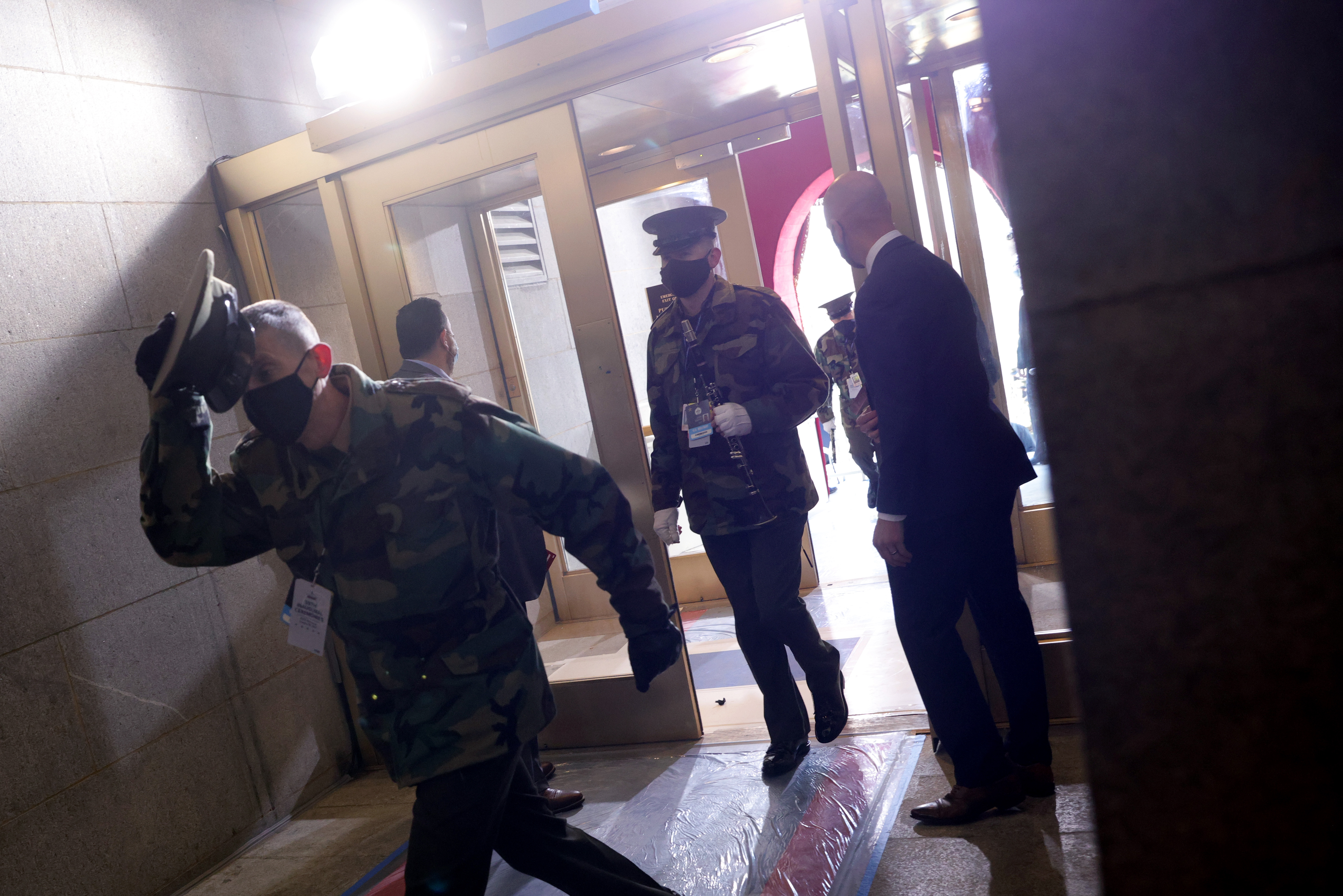 WASHINGTON, DC – JANUARY 18: People are evacuated back inside after an “external security threat” prior to a dress rehearsal for the 59th inaugural ceremony for President-elect Joe Biden and Vice President-elect Kamala Harris at the U.S. Capitol on January 18, 2021 in Washington, DC. Biden will be sworn-in as the 46th president on January 20th.  (Photo by Win McNamee/Getty Images)