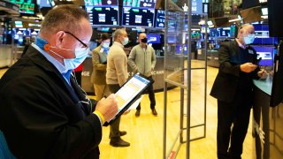 Traders on the floor of the New York Stock Exchange