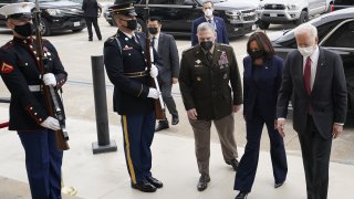 U.S. President Joe Biden and Vice President Kamala Harris arrive at the Pentagon in Arlington, Virginia, U.S., on Wednesday, Feb. 10, 2021.