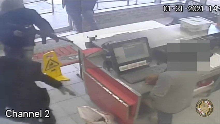 Papa Johns Armed Robbery Surveillance Image