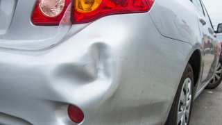 car dent dented car