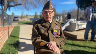 In this Feb. 22, 2021 photo, Sgt. 1st Class Marvin D. Cornett poses for a photo, in in Auburn, Calif. Cornett was awarded the Purple Heart and Bronze Star Medal during a ceremony. Cornett was assigned to Headquarters Company, 1st Battalion, 504th Parachute Infantry Regiment, 82nd Abn. Div. when he made the combat jump into Salerno, Italy and was later wounded during combat operations along the Mussolini Canal at the Anzio beachhead on Dec. 31, 1944.