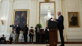 US President Joe Biden speaks during his first press briefing in the East Room of the White House in Washington, DC, on March 25, 2021.