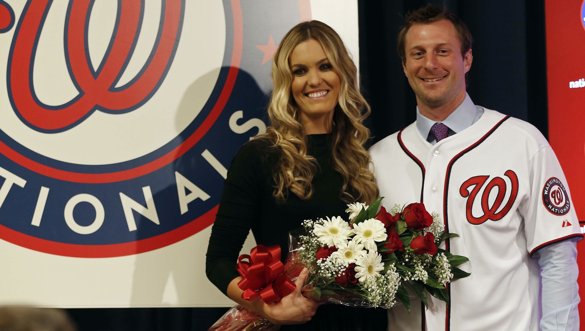 Washington Nationals' Max Scherzer and his wife Erica, second from