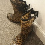 Watts wore heeled leopard-print boots for the occasion.