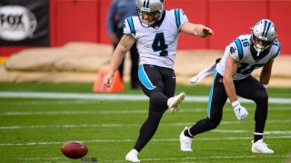 FILE - In this Sunday, Nov. 8, 2020 file photo, Carolina Panthers kicker Joey Slye (4) attempts an onside kick with the Kansas City Chiefs recovered during the second half of an NFL football game in Kansas City, Mo. NFL owners approved eliminating overtime in preseason games and expanded selection of jersey numbers for receivers, running backs and defensive backs. The owners did approve establishing a maximum number of players in the setup zone (between 10 and 25 yards from the kickoff) in hopes of enhancing onside kick opportunities. Defending teams will be limited to nine players in that zone, Wednesday, April 21, 2021.