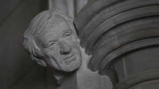 A limestone head of Holocaust survivor and Nobel Peace Prize winning author Elie Wiesel, carved by Sean Callahan from a clay sculpture by artist Chas Fagan, is almost complete in the Human Rights Porch of the Washington National Cathedral, Friday, April 16, 2021.