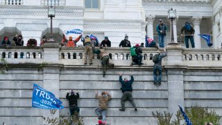 Capitol Riot Trump signs
