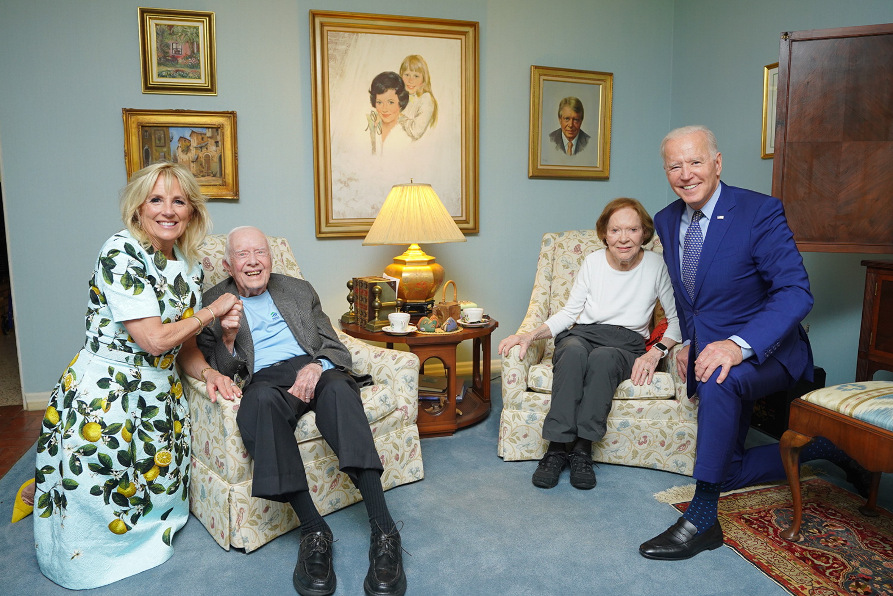 President Joe Biden (far right) and first lady Jill Biden (far left) visit former President Jimmy Carter and former first lady Rosalynn Carter, May 3, 2021, in Plains, Georgia.