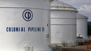 Storage tanks stand at the Colonial Pipeline Co. Pelham junction and tank farm in Pelham, Alabama