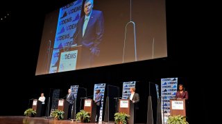 Democratic gubernatorial candidates debating on stage