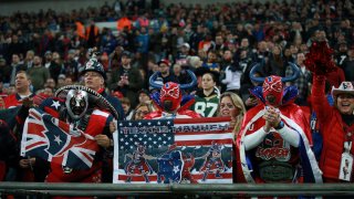 NFL fans watch teams play