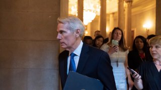 Sen. Rob Portman, R-Ohio, arrives for a meeting at the Capitol in Washington, Wednesday, June 23, 2021. Congressional negotiators and the White House appear open to striking a roughly $1 trillion deal on infrastructure, but they are struggling with the hard part — deciding who will pay for it.
