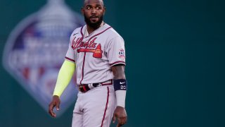 In this May 4, 2021, file photo, Atlanta Braves' Marcell Ozuna stands on the field during the inning of baseball game against the Washington Nationals at Nationals Park in Washington, D.C.