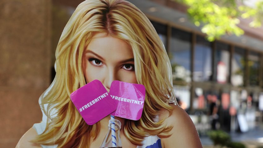 LOS ANGELES, CALIFORNIA – JUNE 23: A cardboard cutout depicting Britney Spears is seen during a #FreeBritney protest at Los Angeles Grand Park during a conservatorship hearing for Spears on June 23, 2021 in Los Angeles, California. Spears is expected to address the court remotely.  Spears was placed in a conservatorship managed by her father, Jamie Spears, and an attorney, which controls her assets and business dealings, following her involuntary hospitalization for mental care in 2008. (Photo by Rich Fury/Getty Images)