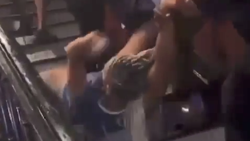 Video captured the moment a woman was dragged down stairs and out of Nellie’s Sports Bar.