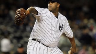 CC Sabathia #52 of the New York Yankees pitches against the Tampa Bay Rays on September 21, 2011 at Yankee Stadium in the Bronx borough of New York City.