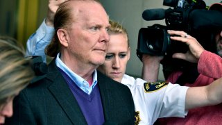 FILE - In this May 24, 2019 file photo, chef Mario Batali departs after pleading not guilty, at municipal court in Boston, to an allegation that he forcibly kissed and groped a woman at a Boston restaurant in 2017.