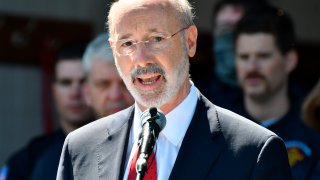 Gov. Tom Wolf speaks at an event in Mechanicsburg, Pennsylvania, May 12, 2021. Beyond the local races on ballots, Pennsylvania’s primary election will determine the future of a governor’s authority during disaster declarations.