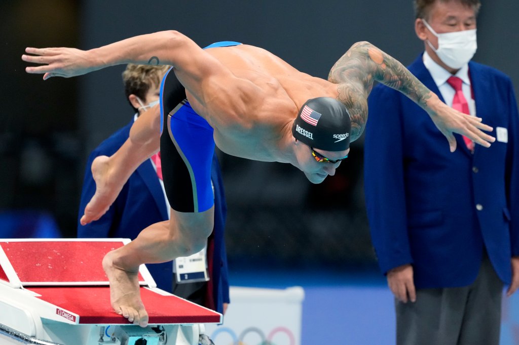Caeleb Dressel of the United States starts in his men's 100-meter freestyle semifinal at the 2020 Summer Olympics, Wednesday, July 28, 2021, in Tokyo, Japan.