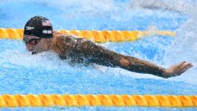 Caeleb Dressel swims the men's 100m butterfly at the Tokyo Olympic Games.