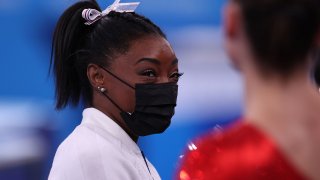 Simone Biles watches women's team final