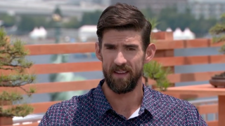 Michael Phelps speaks to NBC's Mike Tirico about Simone Biles and mental health on Tuesday, July 27, 2021.