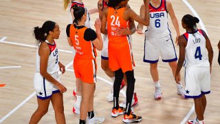 Jul 14, 2021; Las Vegas, NV, USA; Players embrace on the court after the WNBA All Star team defeated Team USA 93-85 in the WNBA All Star Game at Michelob Ultra Arena at Mandalay Bay Resort. Mandatory Credit: Stephen R. Sylvanie-USA TODAY Sports