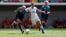 Carli Lloyd of United States battles for the ball against Elin Rubensson of Sweden during a soccer quarterfinal match of the Rio 2016 Olympic Games