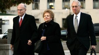 Jack and Jo Ann Hinckley, parents of John Hinckley Jr., the man who shot President Reagan in 1981, leave the federal courthouse with their son's lawyer Barry Levine, right, Monday, Nov. 8, 2004, in Washington.