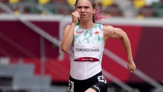 Krystsina Tsimanouskaya, of Belarus, runs in the women's 100-meter run at the 2020 Summer Olympics, Friday, July 30, 2021. Tsimanouskaya alleged her Olympic team tried to remove her from Japan in a dispute that led to a standoff Sunday, Aug. 1, at Tokyo’s main airport. An activist group supporting Tsimanouskaya said she believed her life was in danger in Belarus and would seek asylum with the Austrian embassy in Tokyo.