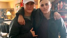 This Dec. 2019, photo provided by Regi Stone shows Eli Stone, left, and Rylee McCollum, at Christmas in Stone's house in Jackson, Wyo. Rylee McCollum, of Bondurant, Wyo., was one of the U.S. Marines killed in the suicide bombing at the Kabul airport, in Afghanistan, according to his sister, Roice McCollum. 