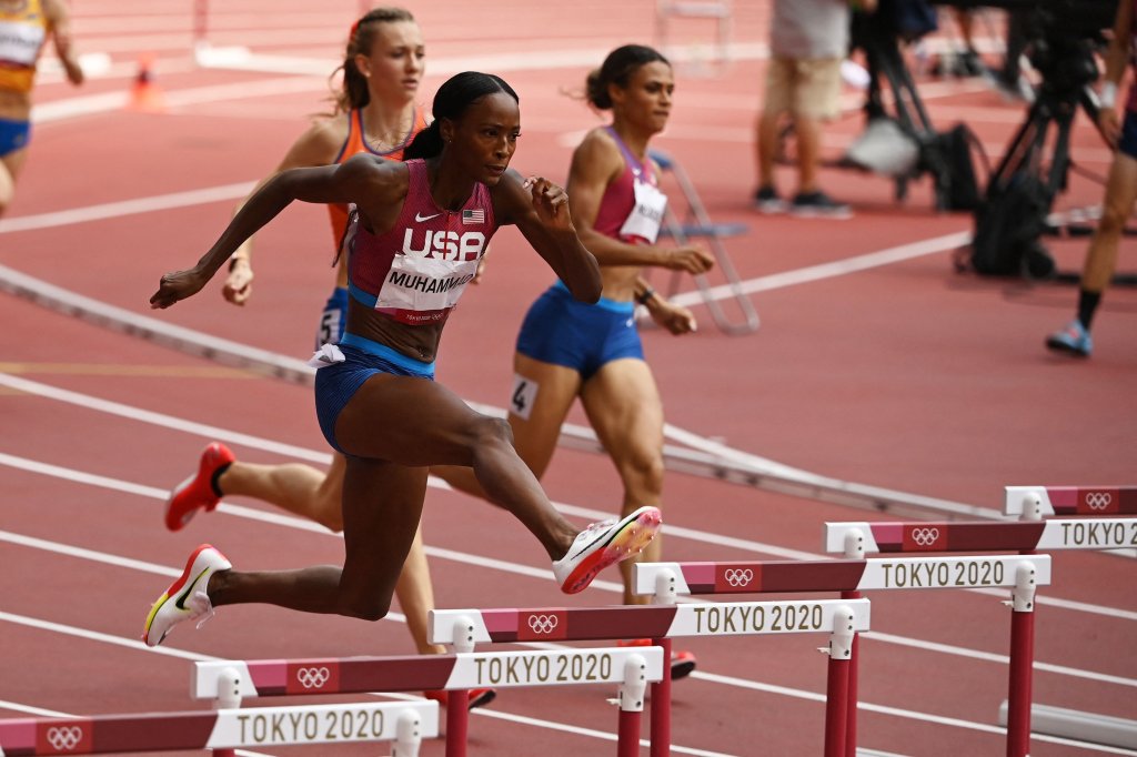The United State's Dalilah Muhammad, Netherlands' Femke Bol and the United State's Sydney Mclaughlin compete in the women's 400m hurdles final during the Tokyo 2020 Olympic Games at the Olympic Stadium in Tokyo, Japan on Aug. 4, 2021.