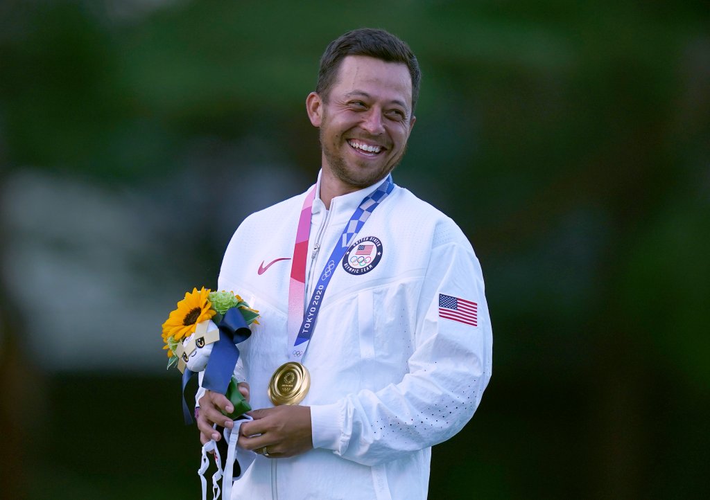 Team USA's Xander Schauffele celebrates with his gold medal after winning the Men's Individual Stroke Golf Tournament at the Kasumigaseki Country Club on the ninth day of the Tokyo 2020 Olympic Games in Japan. Picture date: Sunday Aug. 1, 2021.