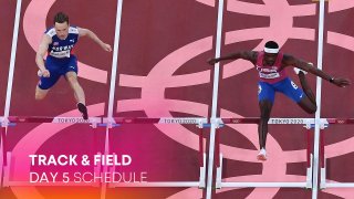 Norway's Karsten Warholm (L) and USA's Rai Benjamin compete in the men's 400m hurdles semi-finals during the Tokyo 2020 Olympic Games