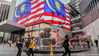 People wearing face masks as a preventive measure against Covid-19 in downtown Kuala Lumpur, Malaysia on Sept. 11, 2021.