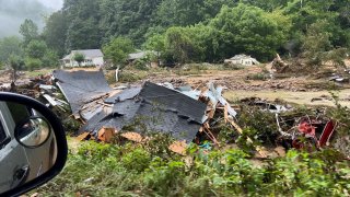 Virginia State Police state and recovery divers assist in recovery efforts in Buchanan County.