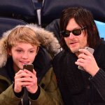 Norman Reedus and Mingus Reedus (L) attend Brooklyn Nets vs New York Knicks at Madison Square Garden on December 2, 2014 in New York City