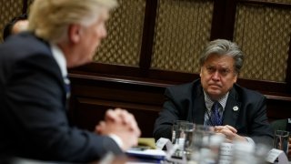 Then-White House Chief Strategist Steve Bannon listens as President Donald Trump speaks during a meeting on cyber security in the Roosevelt Room of the White House in Washington, Tuesday, Jan. 31, 2017.