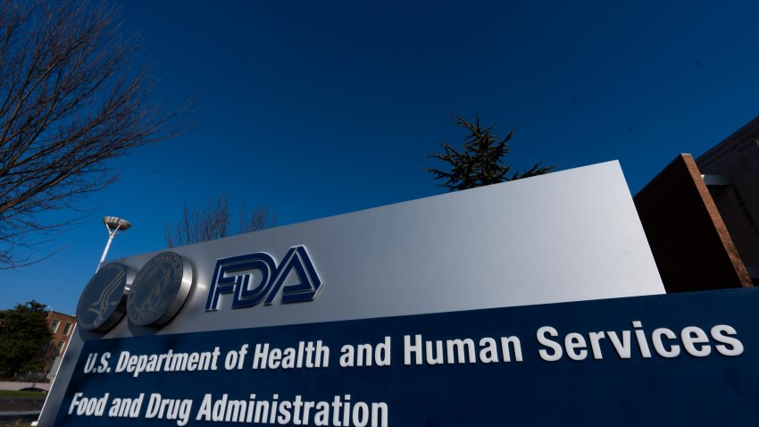 FILE- In this Dec. 10, 2020, file photo, a sign is displayed for the Food and Drug Administration